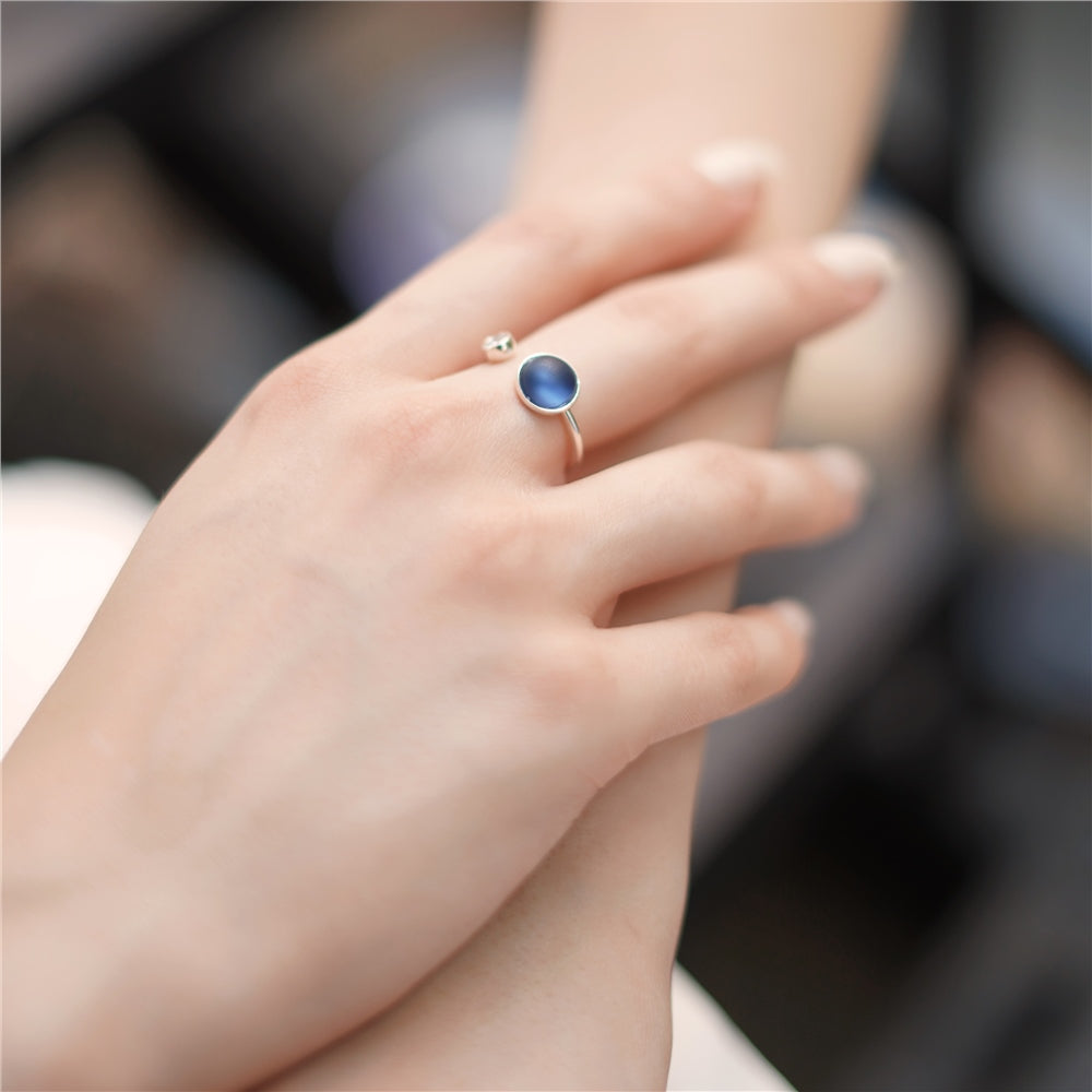 Ring with Blue and Clear Stone Settings