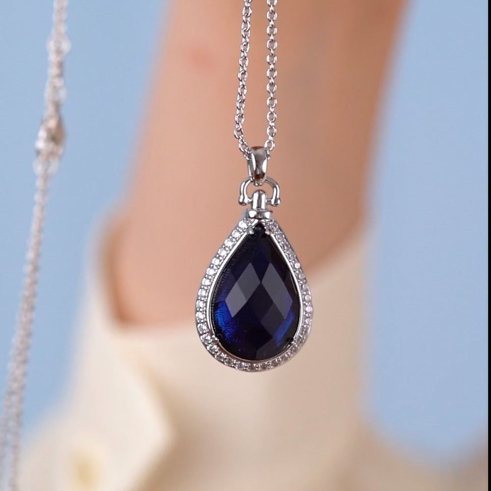 Locket with Sapphire Blue Stone