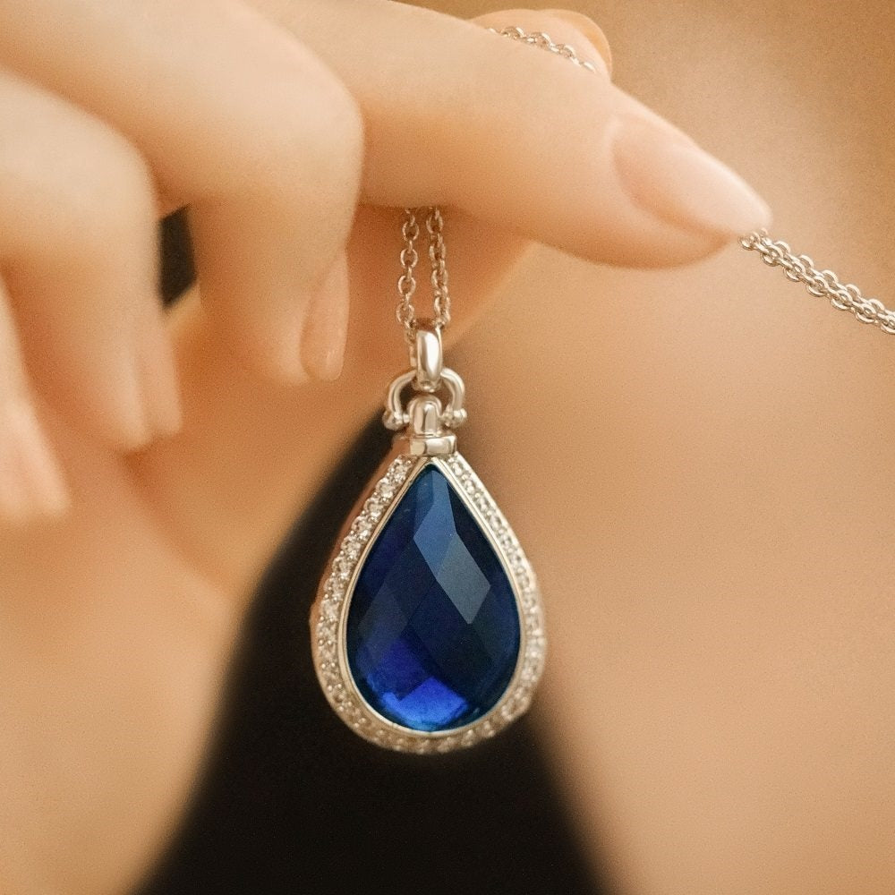 Locket with Sapphire Blue Stone