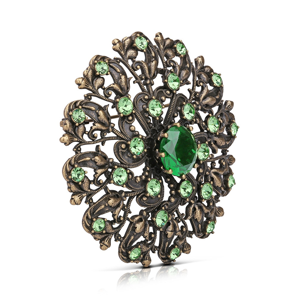 Floral Brooch with Green Stones