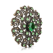 Floral Brooch with Green Stones