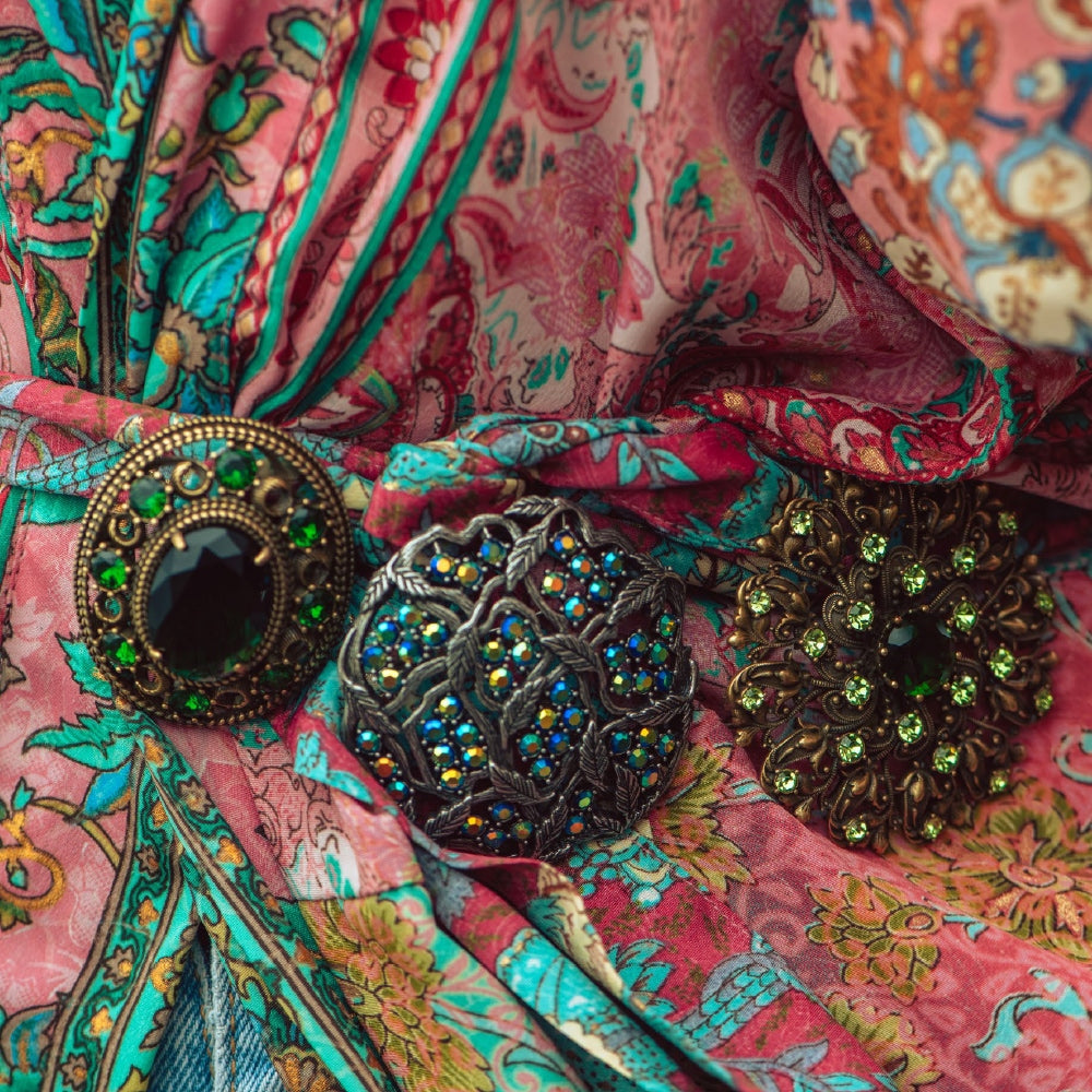 Floral Brooch with Green Stones