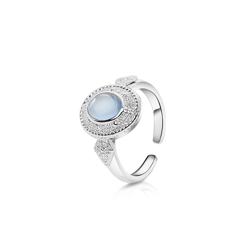 Ornate Ring with Light Blue Stone