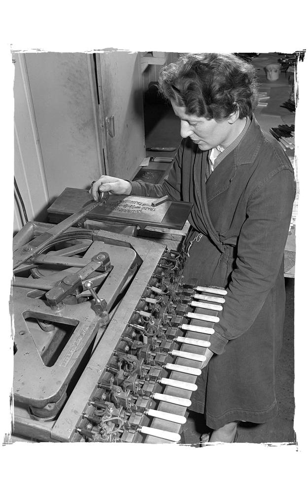 our-story-woman-at-machine.png
