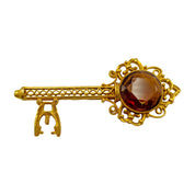 1980's Gold Tone Amber Rhinestone Key Brooch